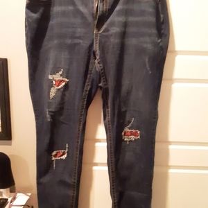 Jeans with distressing & red,black patches